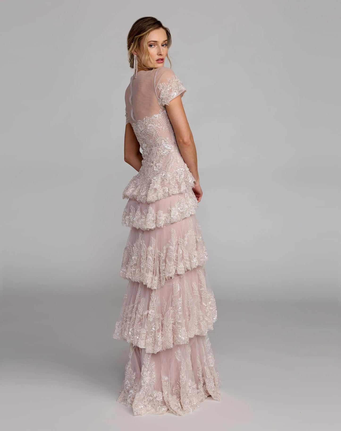 Light Pink Embellished High Neck Gown With Tiered Ruffle Skirt